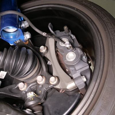 Cusco 23-25 Toyota GR Corolla Light Weight Front Brake Caliper Bracket - Billet Aluminum