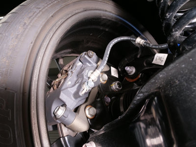 Cusco 23-25 Toyota GR Corolla Light Weight Rear Brake Caliper Bracket - Billet Aluminum