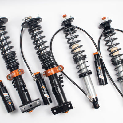 AST 2021+ Toyota Yaris GXPA16 AWD 5200 Series Coilovers w/ Springs & Droplink - QDC Front