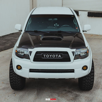 Seibon 05-11 Toyota Tacoma TR-Style Carbon Fiber Hood